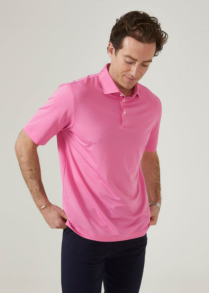 Men's 3 button polo shirt in carnation pink.