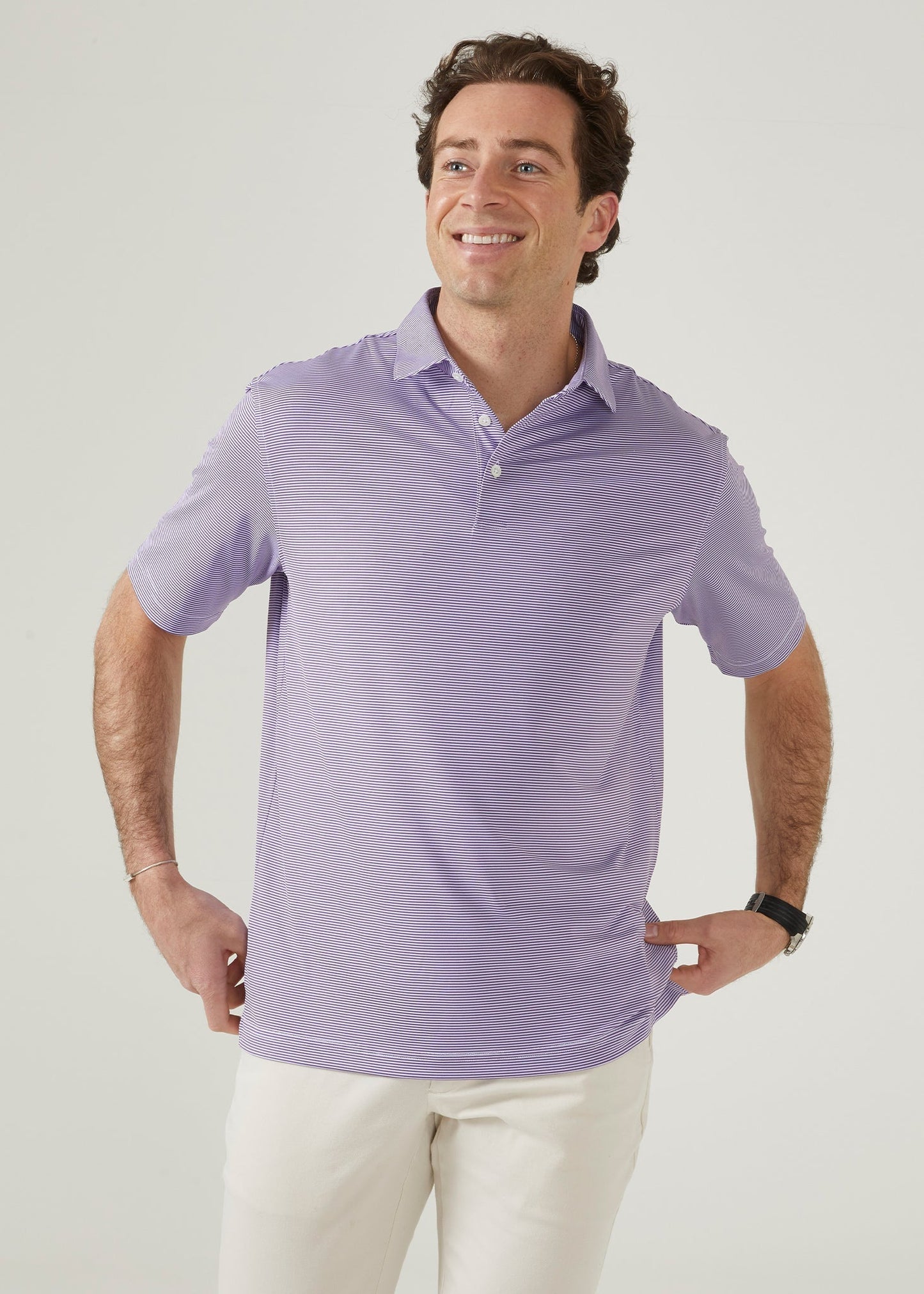 Polo shirt made from polyester with 3 button collar in plum with white stipes.