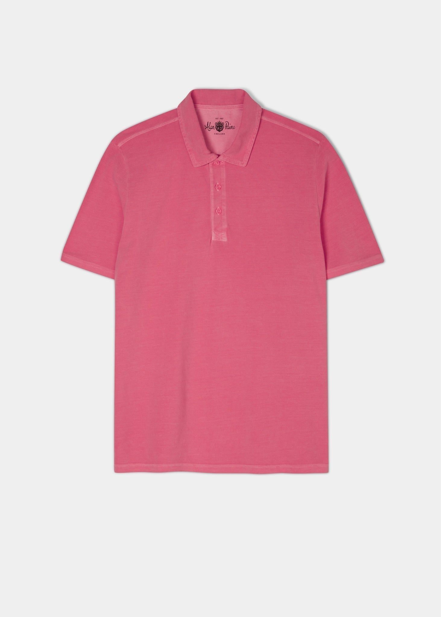 calypso pink polo shirt with short sleeves made from 100% preuvian cotton.